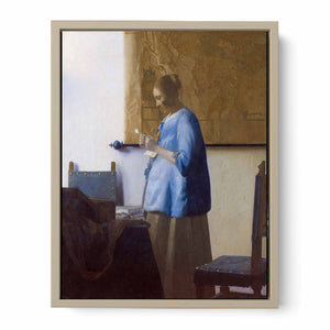 Woman in Blue Reading a Letter