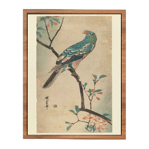 Green Parrot on a branch with red flowers