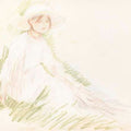 Fillette assise dans l'herbe