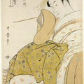 Komurasaki of the Tamaya with pipe in hand 