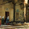 Harem Women Feeding Pigeons in a Courtyard Painting by Jean-Leon